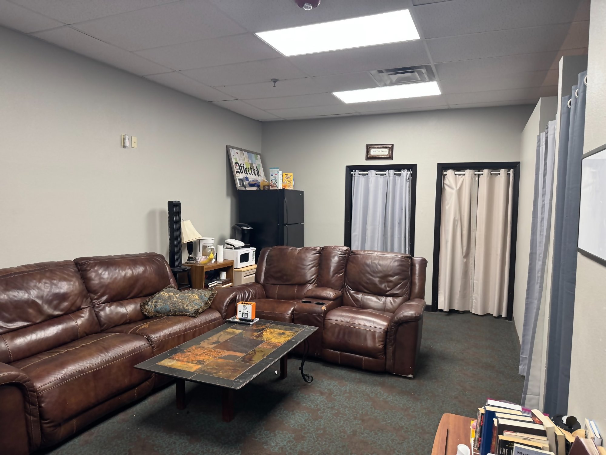 Men's Living Quarters - Comfortable Residential Living Area with Seating and Privacy