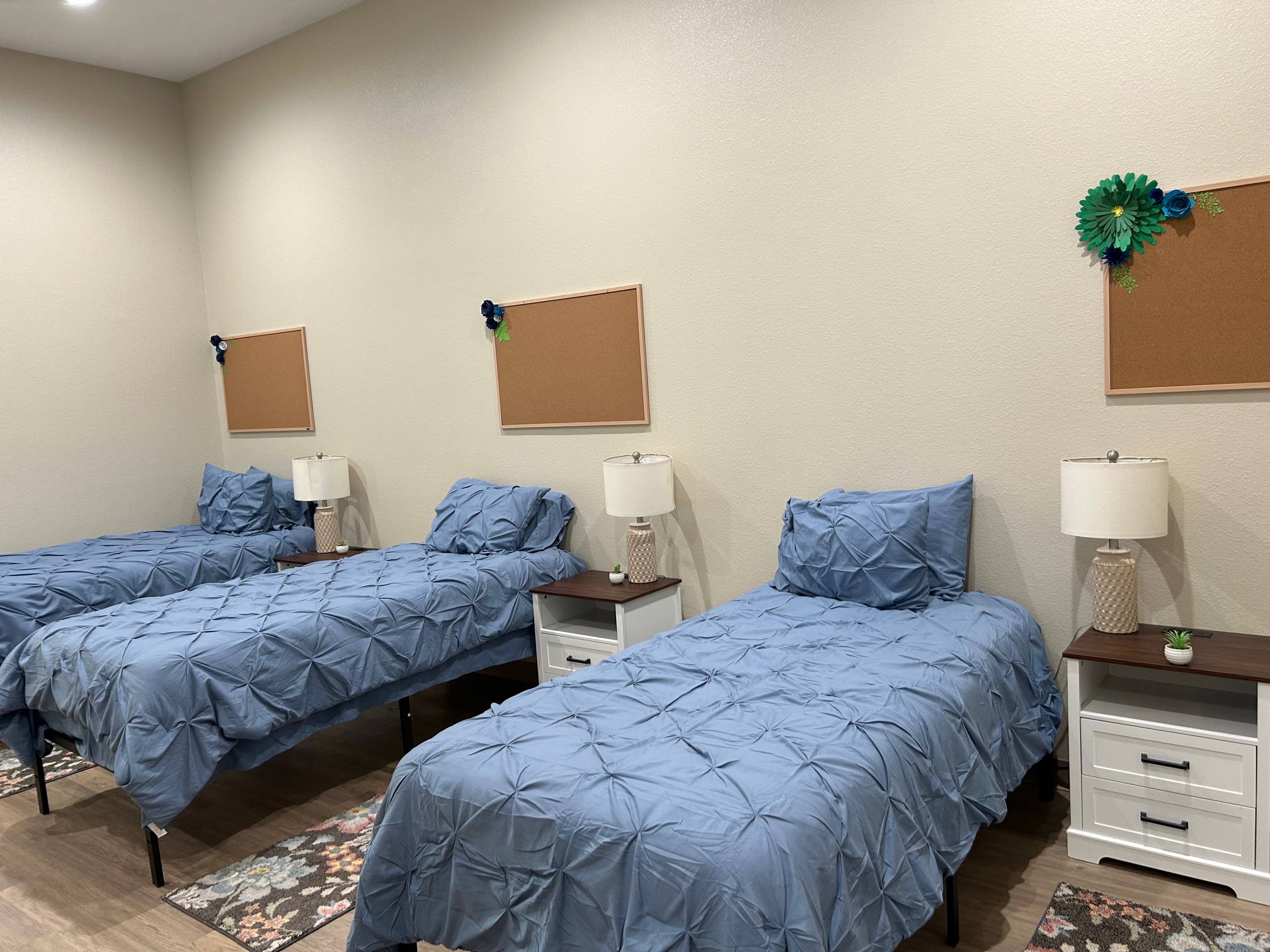 Women's Recovery Home Bedrooms with Blue Bedding