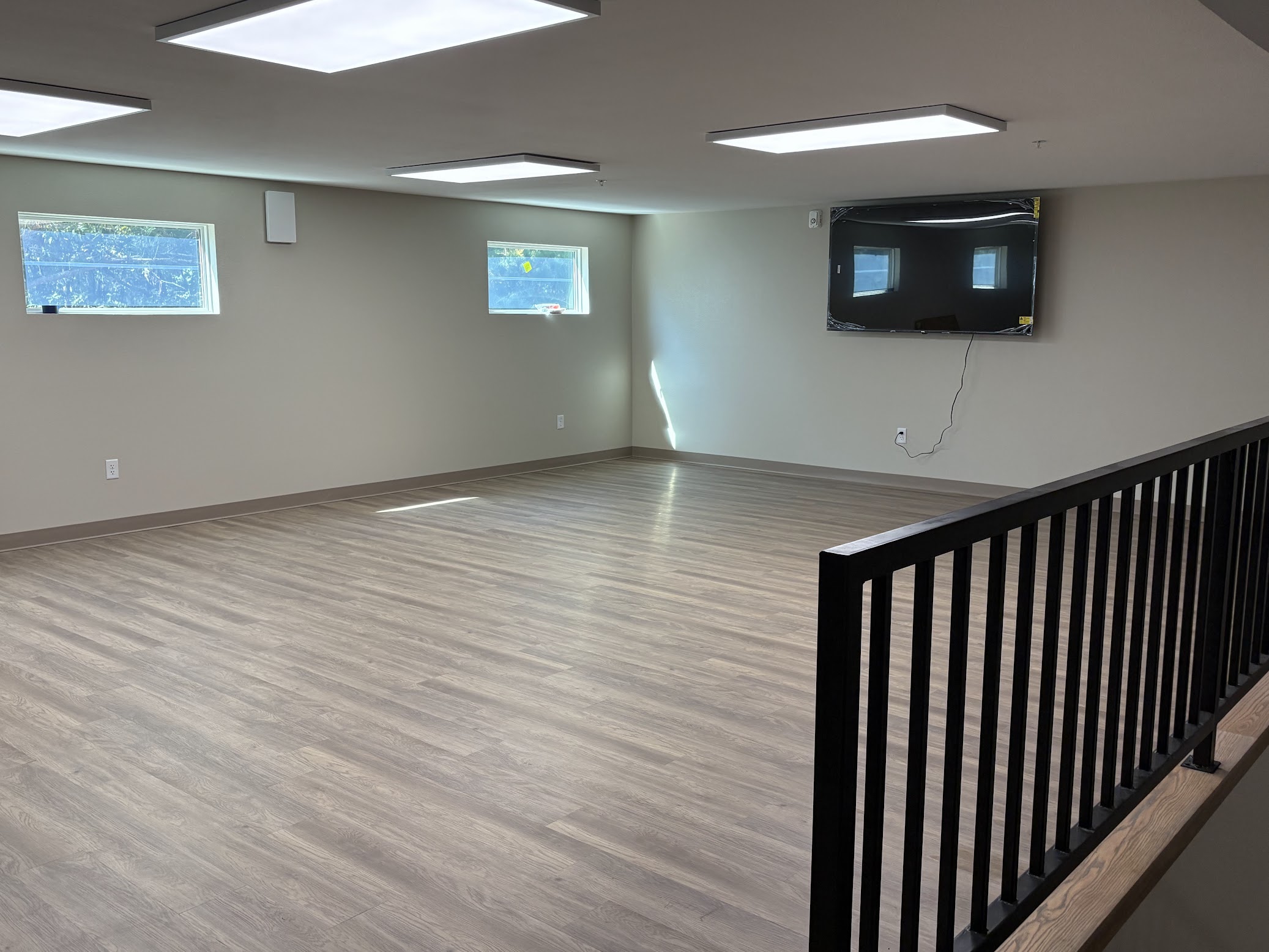 Women's Common Area with Modern Flooring and Natural Light