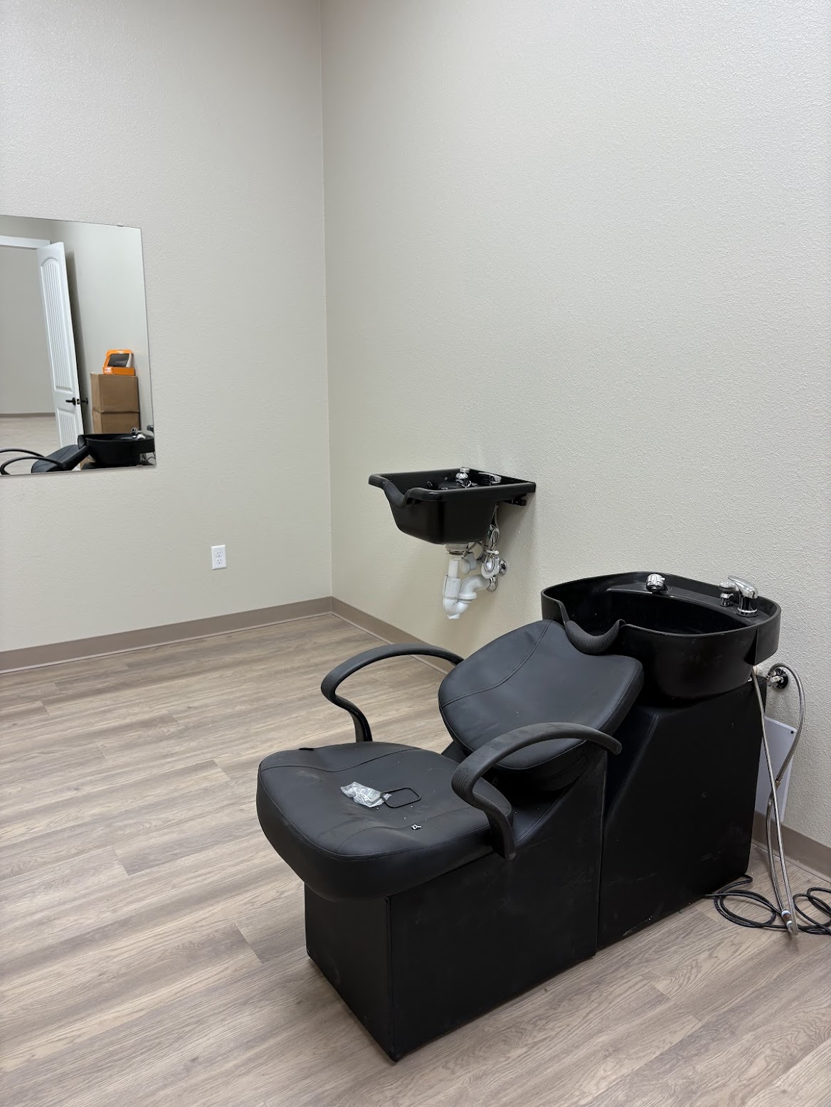 Professional Hair Salon with Shampoo Bowls and Styling Stations